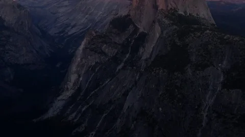 Sun setting on half dome at yosemite recorded from glacier point Stock Footage 81804052