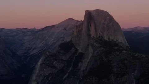 Sun setting on half dome at yosemite recorded from glacier point Stock Footage 81804062