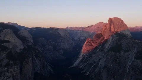 Sun setting on half dome at yosemite recorded from glacier point Stock Footage 81804065