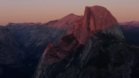 Sun setting on half dome at yosemite recorded from glacier point Stock Footage 81804070