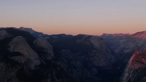 Sun setting on half dome at yosemite recorded from glacier point Stock Footage 81804077