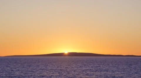 Sun Setting On Island Stock Photos