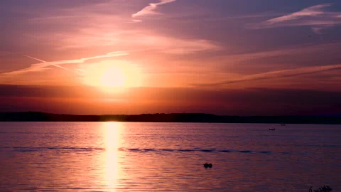 Sun setting on a lake Stock Footage 155822164