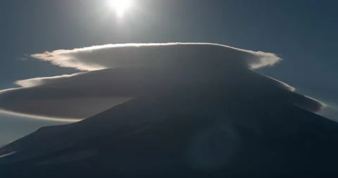 The Sun Setting on to the Lenticular Clouds at Top of Mt. Fuji (Tilt Up) Stockbeeldmateriaal 149225767