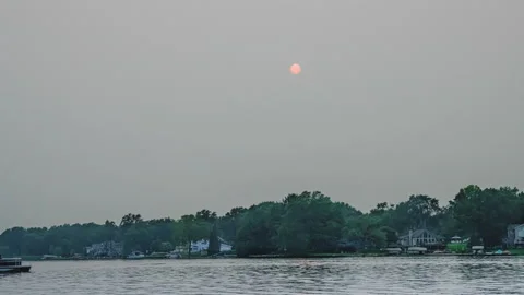 Sun Setting Obstructed By Haze From Western Wildfires -Time-Lapse Stock Footage 171189394