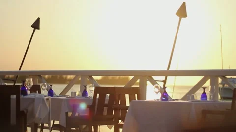 Sun Setting on Ocean at Tropical Patio Video stock 22095964