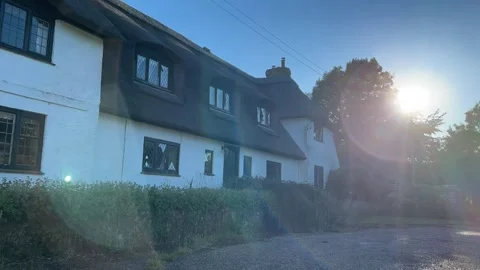 Sun setting by old Tudor House Stock Footage 278056911