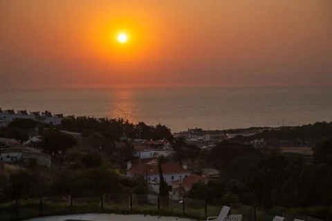 The sun setting over the atlantic ocean Stock Photos