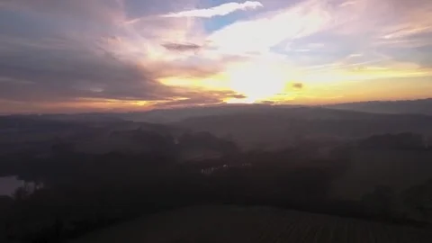 Sun Setting Over a Calm and Quiet Rural Countryside Stock Footage 156191179