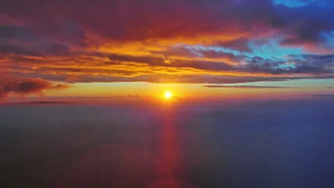 Sun setting over calm sea natural landscape Stock Footage 345448594