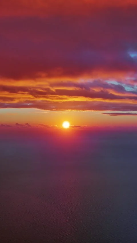 Sun setting over calm sea natural landscape Stock Footage 346652922
