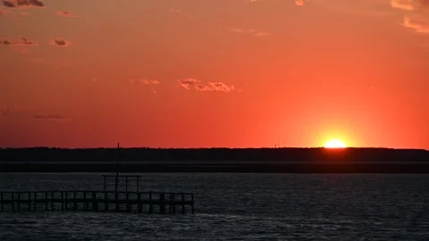 Sun Setting Over the Chincoteague Channel, Chincoteague, Virginia, USA Stock Footage 269611729