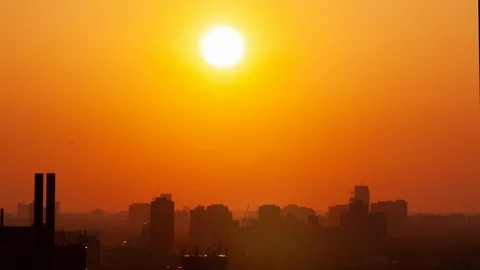 Sun setting over City Gt0102 Stock Footage 125341637
