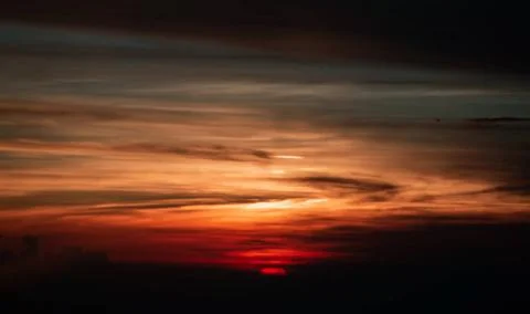 sun setting over clouds views from airplane sun setting over clouds views... Stock Photos