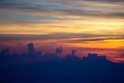  sun setting over clouds views from airplane sun setting over clouds views... Stock Photos
