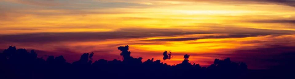  sun setting over clouds views from airplane sun setting over clouds views... Stock Photos