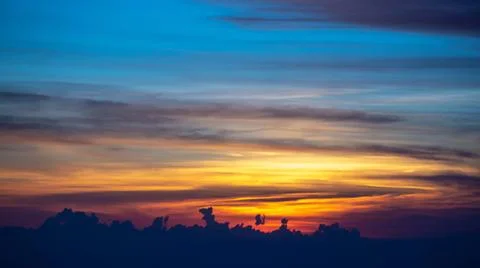  sun setting over clouds views from airplane sun setting over clouds views... Stock Photos
