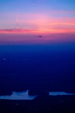  sun setting over clouds views from airplane sun setting over clouds views... Stock Photos