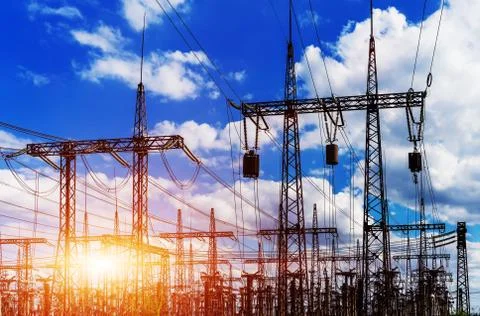 Sun setting over an electrical substation Fotos de archivo