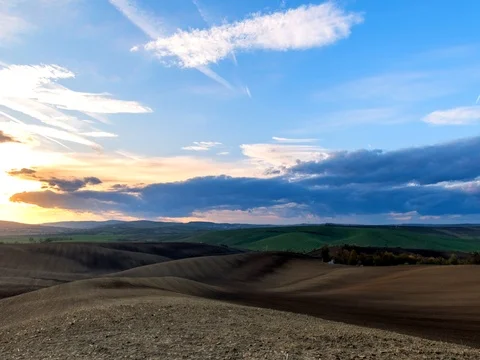 Sun setting over fields in South Moravia, Czech Republic. Video stock 81344689
