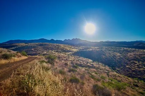 Sun setting over the Four Peaks Wilderness Area in the Tonto National Fores.. Stock Photos