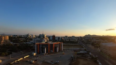 Sun Setting Over Gaborone Central Business District, Botswana Stock Footage 100369755