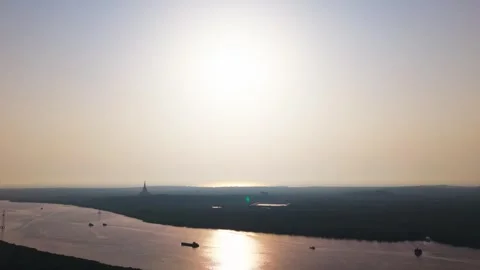 Sun Setting Over Gorai Creek’s Calm Surface – Drone View Mumbai Stock Footage 307771353