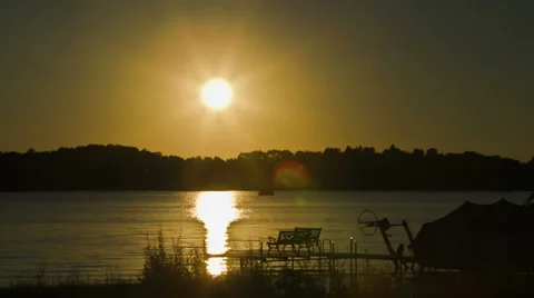 Sun setting over the horizon - 4K Ultra HD time lapse Video stock 35326782