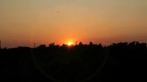 Sun Setting Over Horizon  Stock Footage 496026