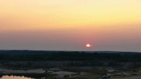 Sun setting over the horizon - Time lapsed Stock Footage 29656201