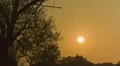 Sun setting over the horizon - Time lapsed HD Footage