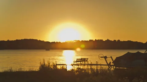 Sun setting over the horizon - Time lapsed Stock Footage 29656339