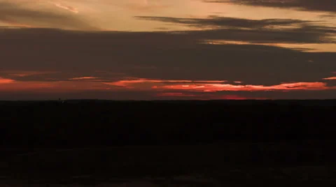 Sun setting over the horizon - Time lapsed 動画素材 29656616