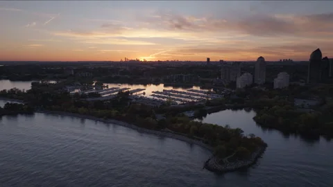 Sun Setting over Humber Bay Marina and Toronto Skyline Drone Stock Footage 345684195
