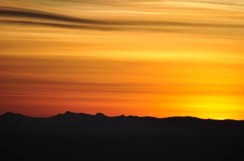 Sun setting over the ice shelf on ross island Stock Photos