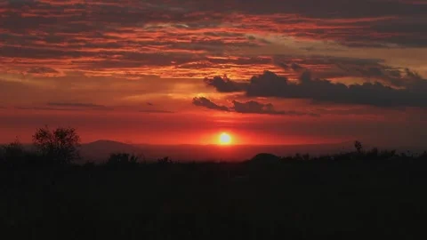 The sun setting over the Inland Empire Stock Footage 272499402