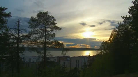 Sun setting over an lake  Stock Footage 10790049