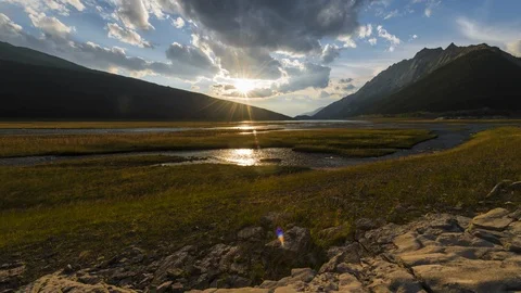 Sun setting over medicine lake 4K Stock Footage 111119342