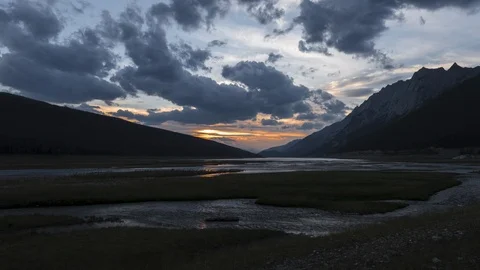Sun setting over medicine lake 4K Stock Footage 111123932