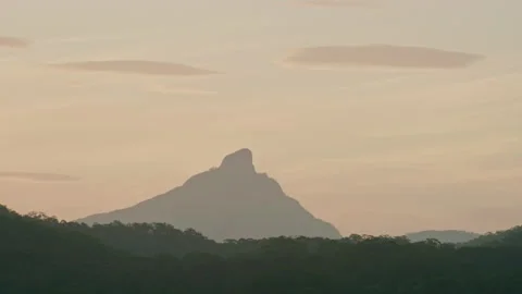 Sun setting over Mt Warning sacred aboriginal location in Australia Stock Footage 153142118