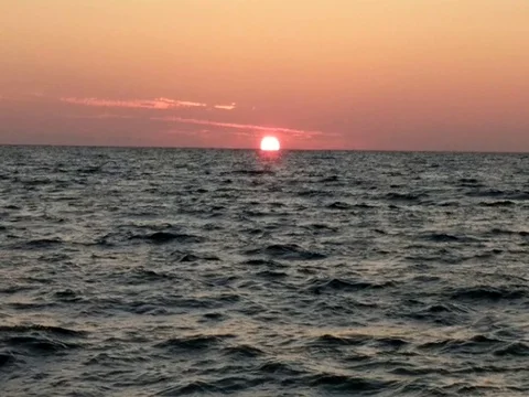 The Sun Setting over the Ocean 2 of 4 Stock Footage 80725035