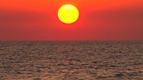 Sun setting over the ocean Stock Footage 38322327
