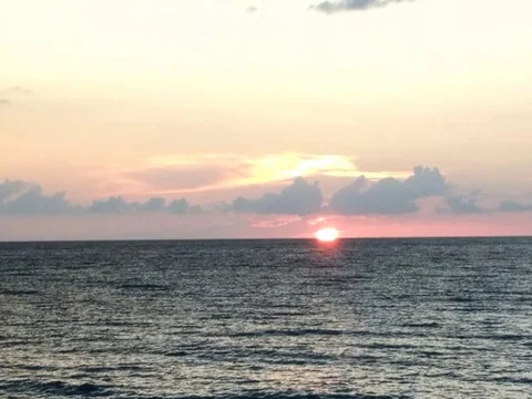 Sun Setting Over the Ocean Stock Footage 80688736