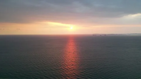 The sun is setting over the ocean Video stock 325824963