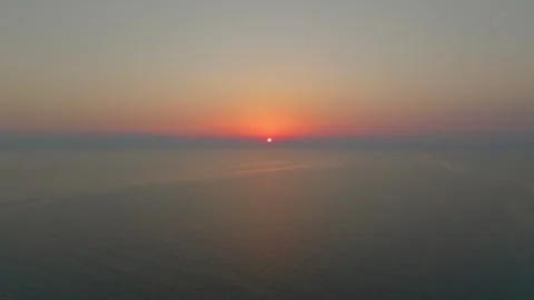 Sun Setting Over Ocean Horizon Stock Footage 263679910