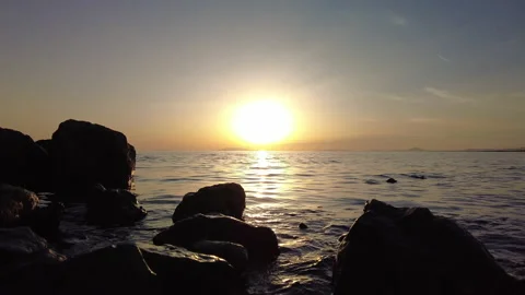 The sun setting over the ocean in the Mediterranean Stock Footage 200820999