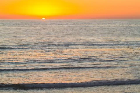 Sun Setting over Ocean 스톡 사진