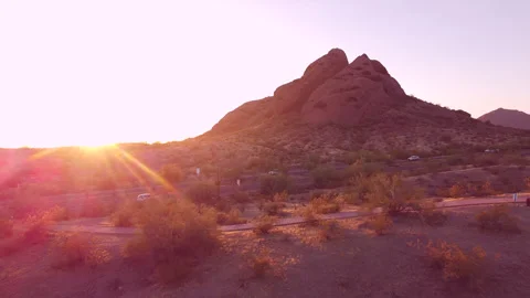 Sun setting over Phoenix, Arizona.   Dusk drone footage of Papago Park Stock Footage 132892458