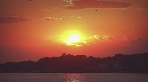 Sun Setting over a River Video stock 12522355