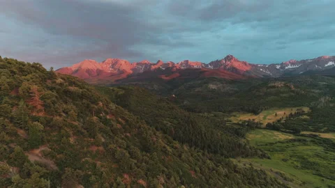 Sun setting over the Rocky Mountains Stock Footage 154884135